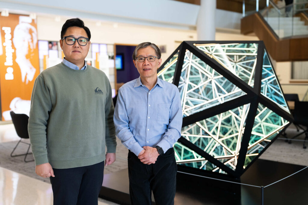 Professor Dr. Chih Lai, right, and graduate student Jihun Moon, left, pose for a portrait in Schoenecker Center on February 10, 2025. Professor Lai and Moon are part of a team of scholars collaborating with University of Minnesota students and professor on a project analyzing artificial intelligence surgical practices.